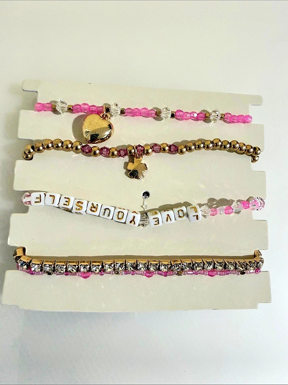 Assorted Pink & Gold Bracelets